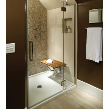 Low threshold shower with seat clearance