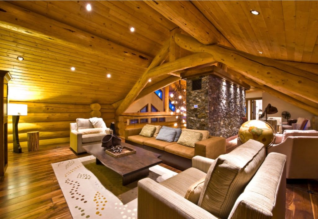 comfy man cave by Sticks and Stones Design Group